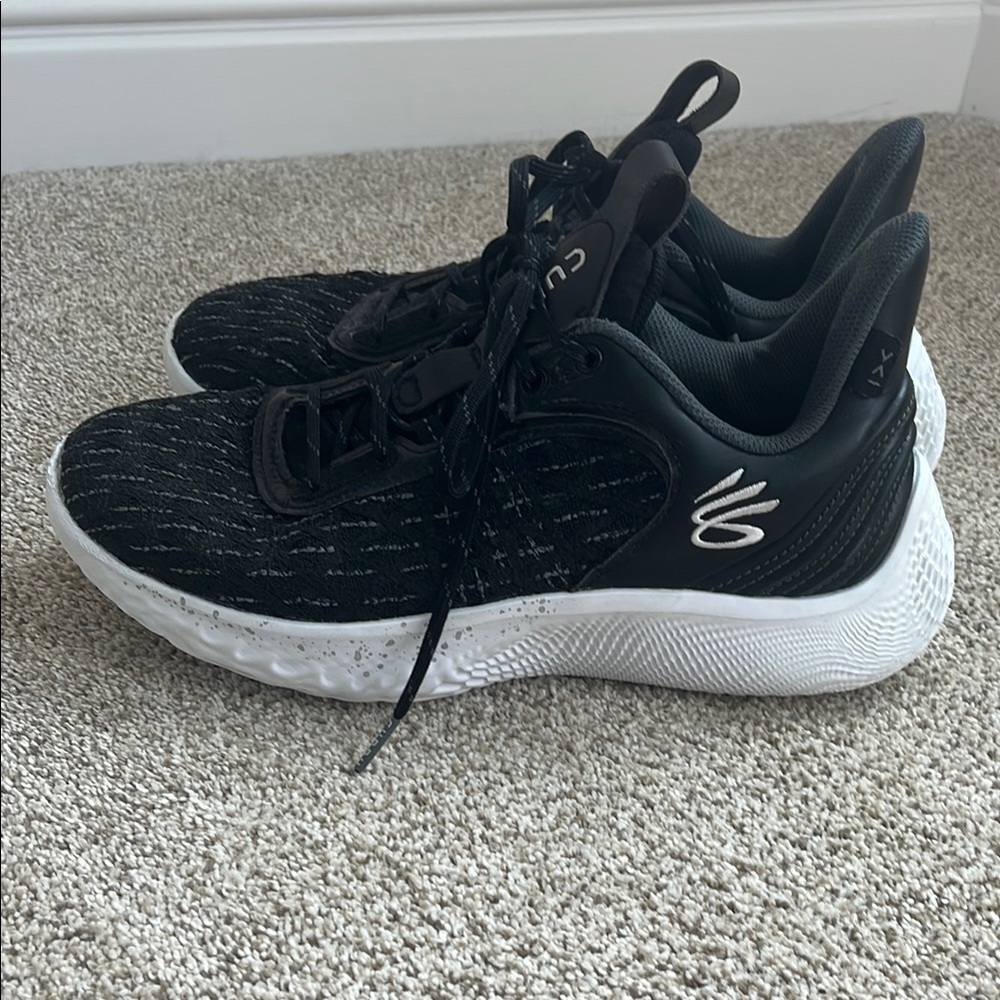 Black and White Under Armor curry, basketball shoes